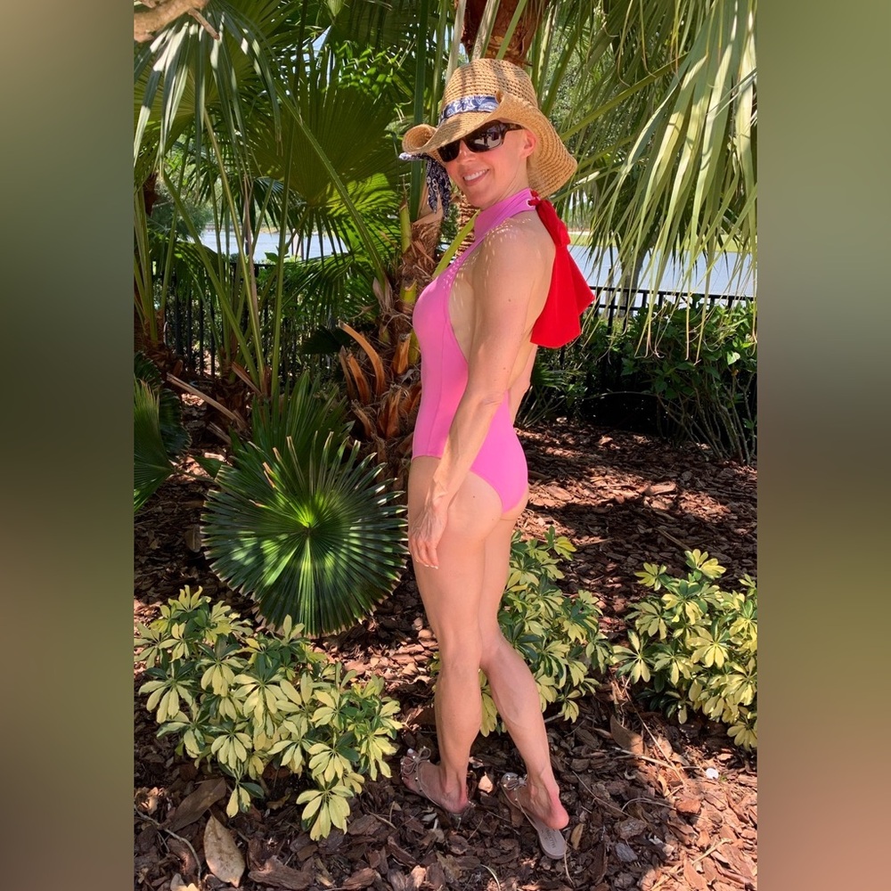 Oye Swimwear Halter One-Piece Swimsuit in Pink with Red Back Tie